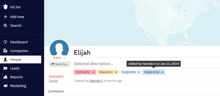 a screenshot of a contact with four colored tags attached to the contact name on the Nutshell dashboard